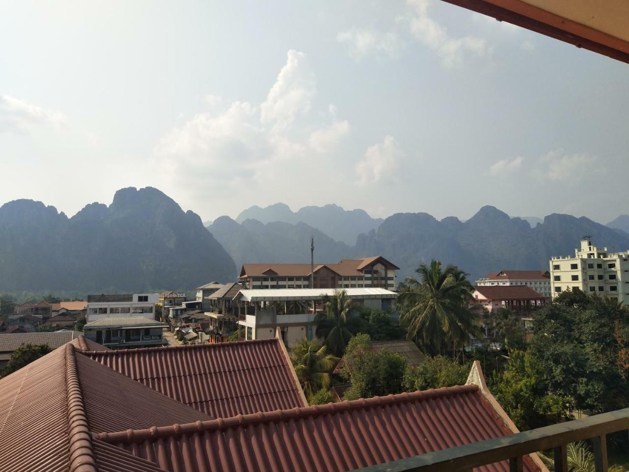 Pangu Hotel - 盘古酒店 Vang Vieng Bagian luar foto