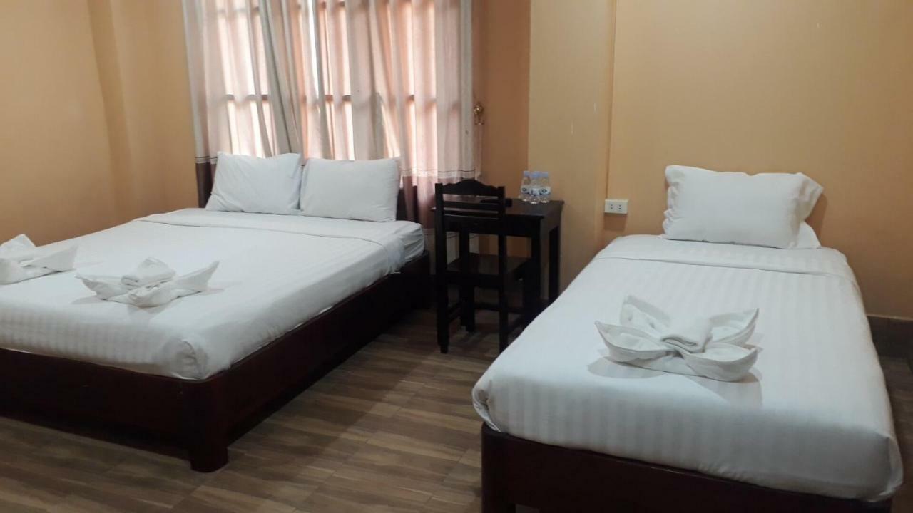 Pangu Hotel - 盘古酒店 Vang Vieng Bagian luar foto